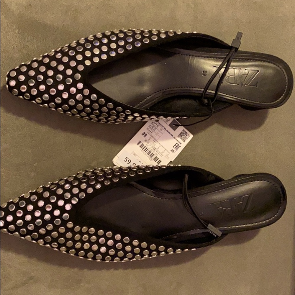 Never worn studded shoes